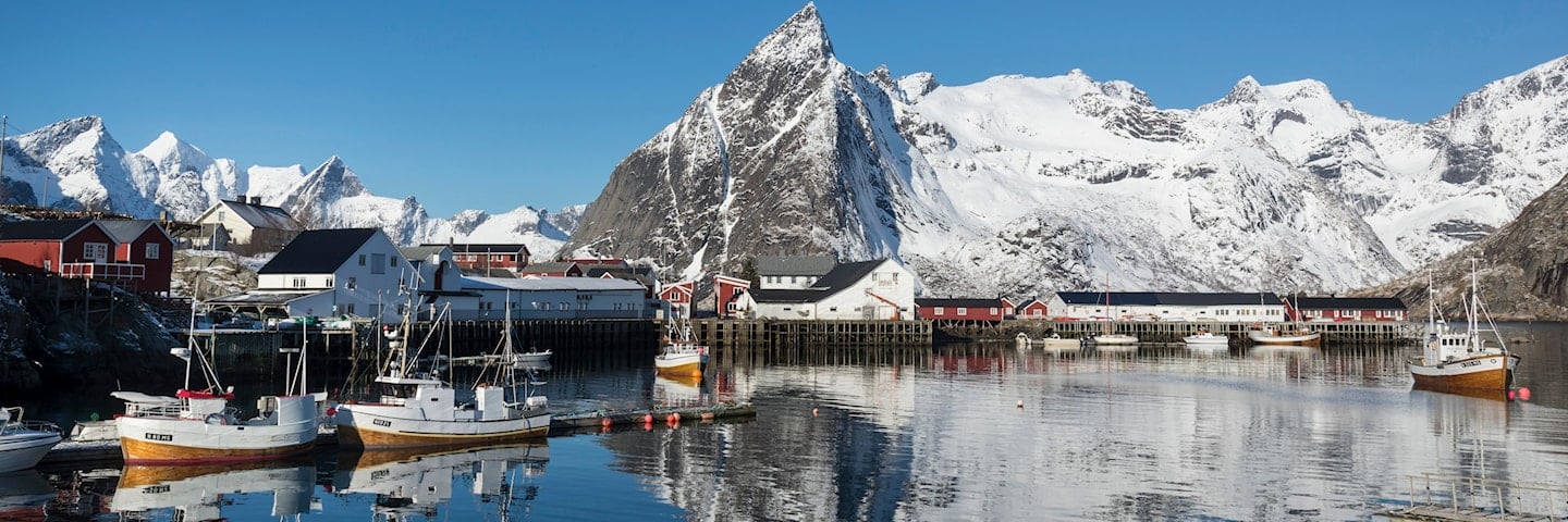 The Skagsanden beach with mountains in the background.