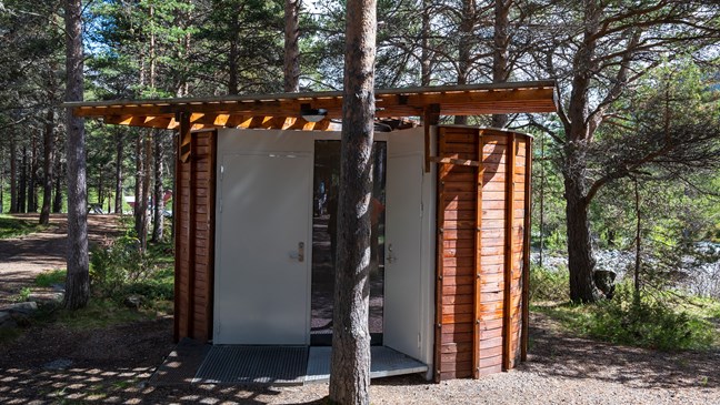 The newly restored toilet building. 